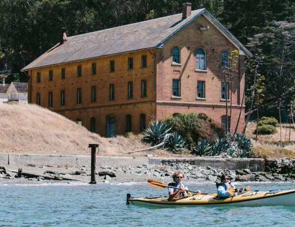 tandem kayaker leaving angel island