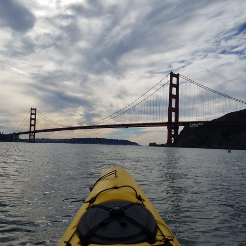 kayaking on a calm day underneath the golden gate bridge kayaking on a calm day underneath the golden gate bridge