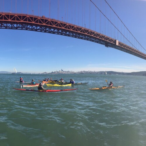 kayaking underneath the Golden Gate Bridge in San Francisco kayaking underneath the Golden Gate Bridge in San Francisco