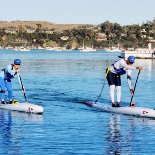 Enlight118 Intermediate Stand-Up Paddleboard class at Sea Trek where the instructor is teaching the student better technique.