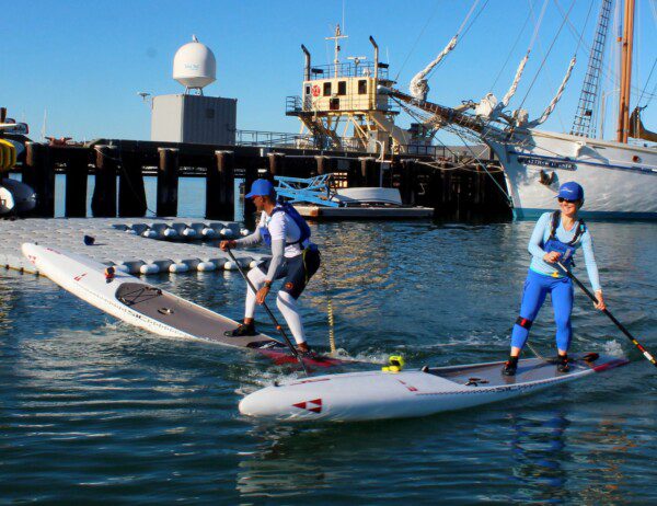 Advanced SUP class at Sea Trek where the instructor is teaching the student advanced turning techniques.