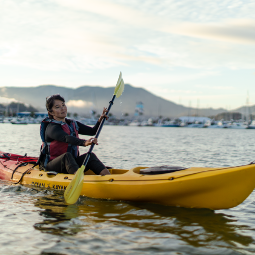 CB7A1603 Lady learning how to paddle her sit on top kayak through the waters of Richardson Bay by Sausalito, CA