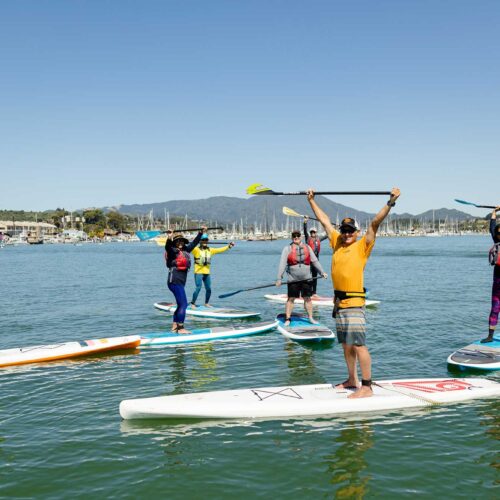San-Francisco-Stand-Up-Paddle-Boarding Group of Stand Up Paddleboarders heading out into Richardson Bay on their Sausalito SUP Tour